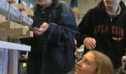 This video features students working in teams to build, test, and re-build their paper wings using better designs for each revision.
