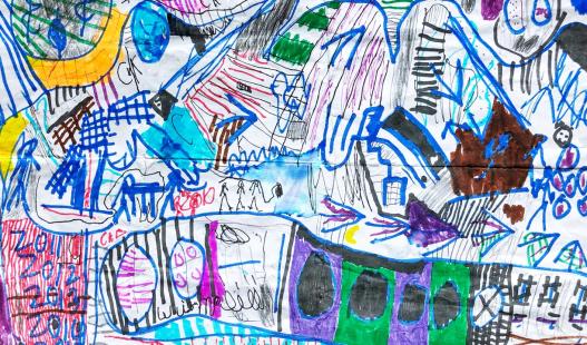 A child’s colorful drawing of an intricate map.
