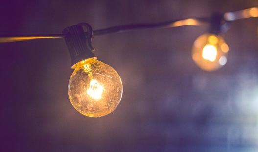 Closeup photo of a lightbulb on a string of lights